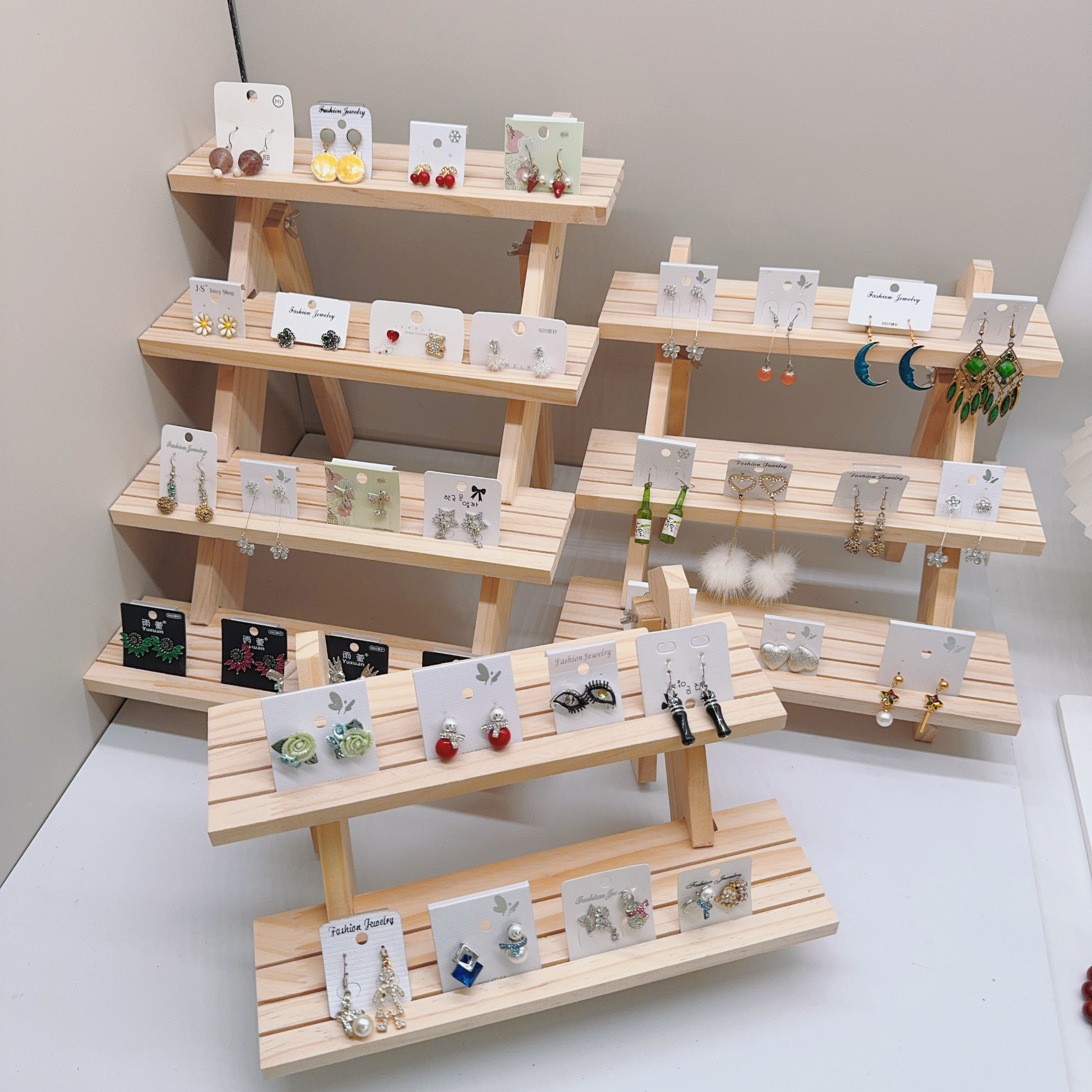 Держатель для ушей, многоуровн – обзор и цена Display Risers Set